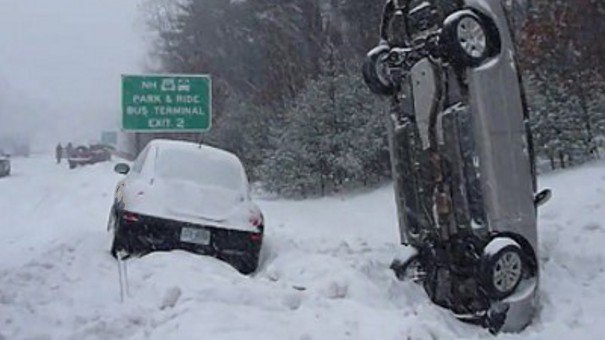 Car Stuck Like a lawn dart in the snow.