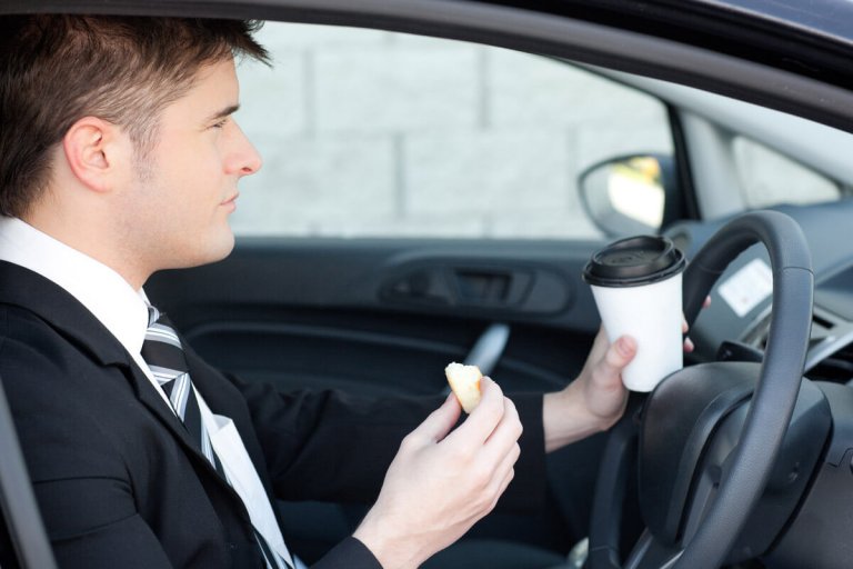 Drinking coffee and eating on your commute.