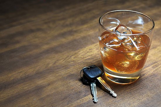 Alcoholic drink next to car keys