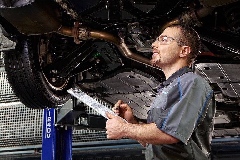 Mechanic doing presale inspection