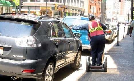 Parking enforcement on a segway.